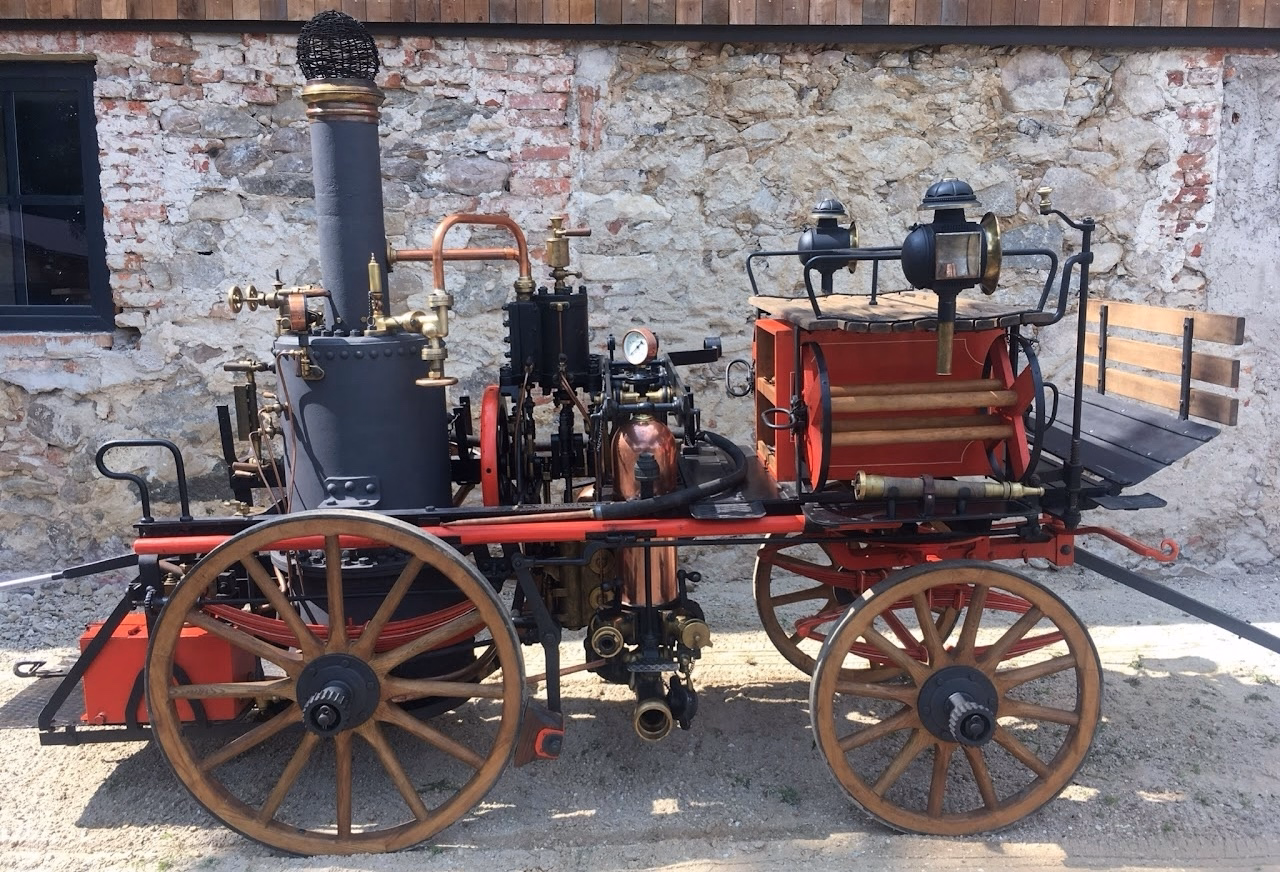 Machine #1 right-side view with complete restored frame and hose unit